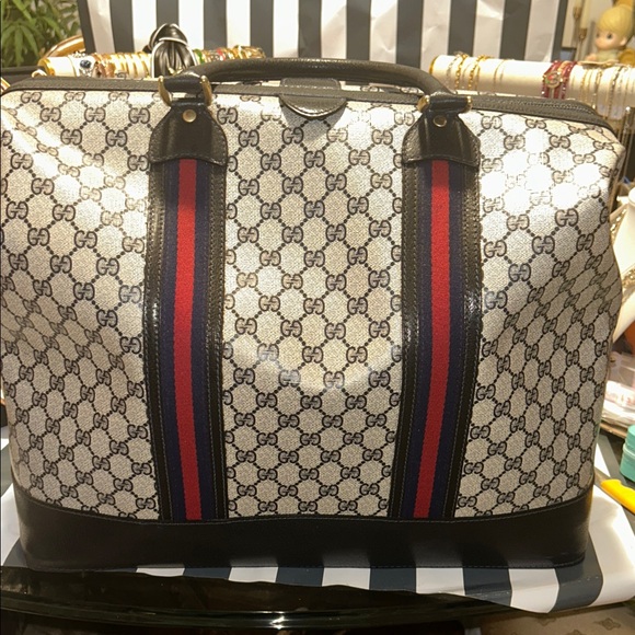 Gucci Handbags - Easter Sale -Hot Price!! Gucci Blue Monogram Duffle Travel Bag